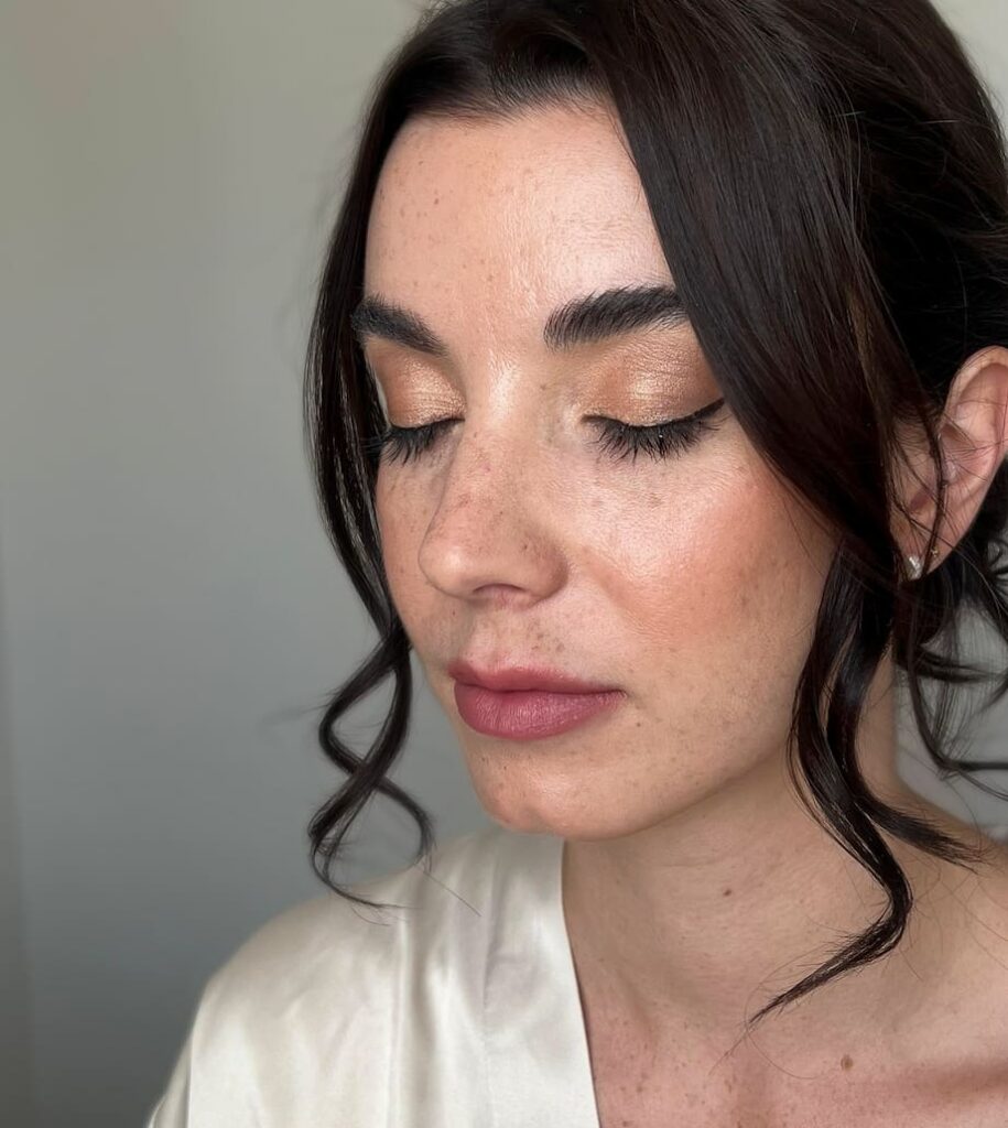 soft glow makeup on bridesmaid